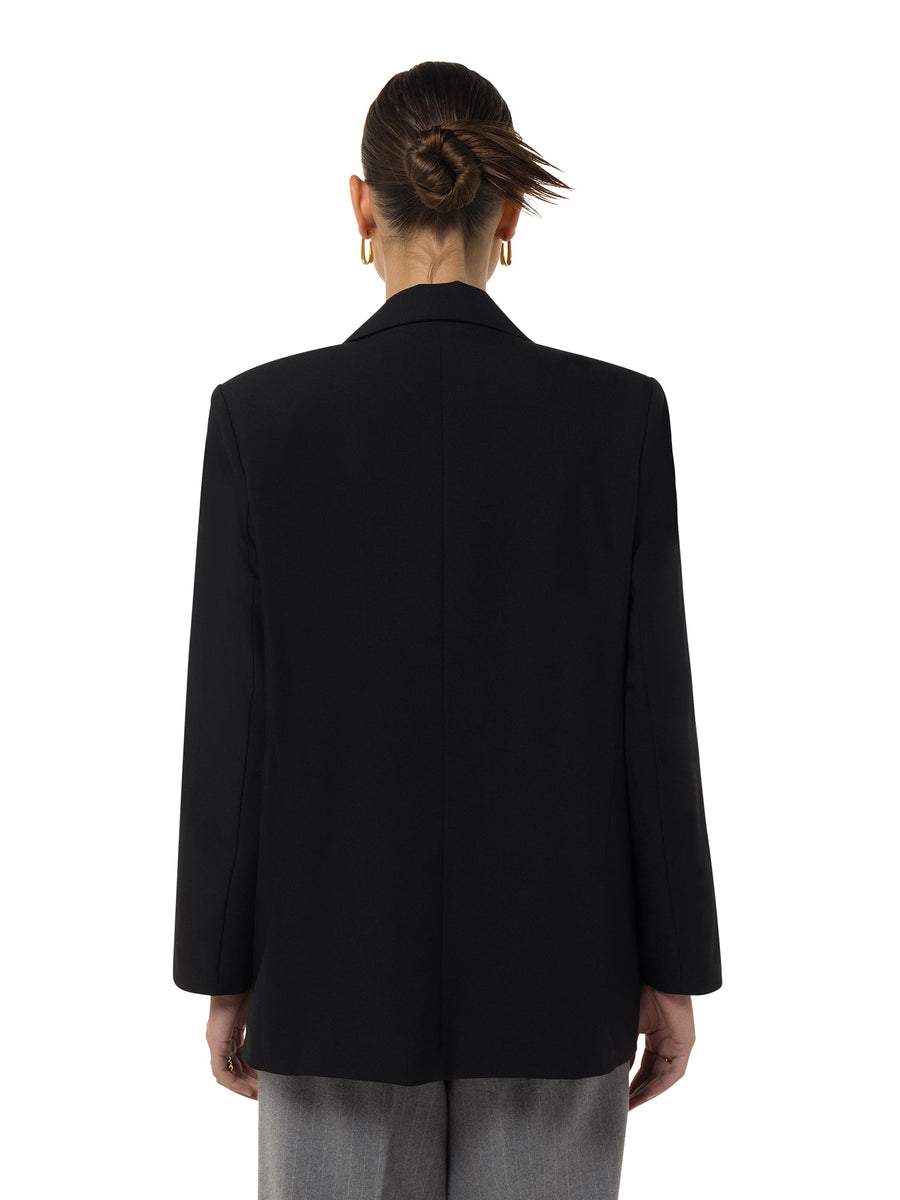 Back view of Grandeur Noir black blazer – elegant structured fit – GCC