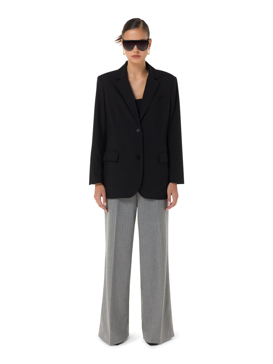 Formal styling of Grandeur Noir black blazer with sunglasses – ALALYA UAE