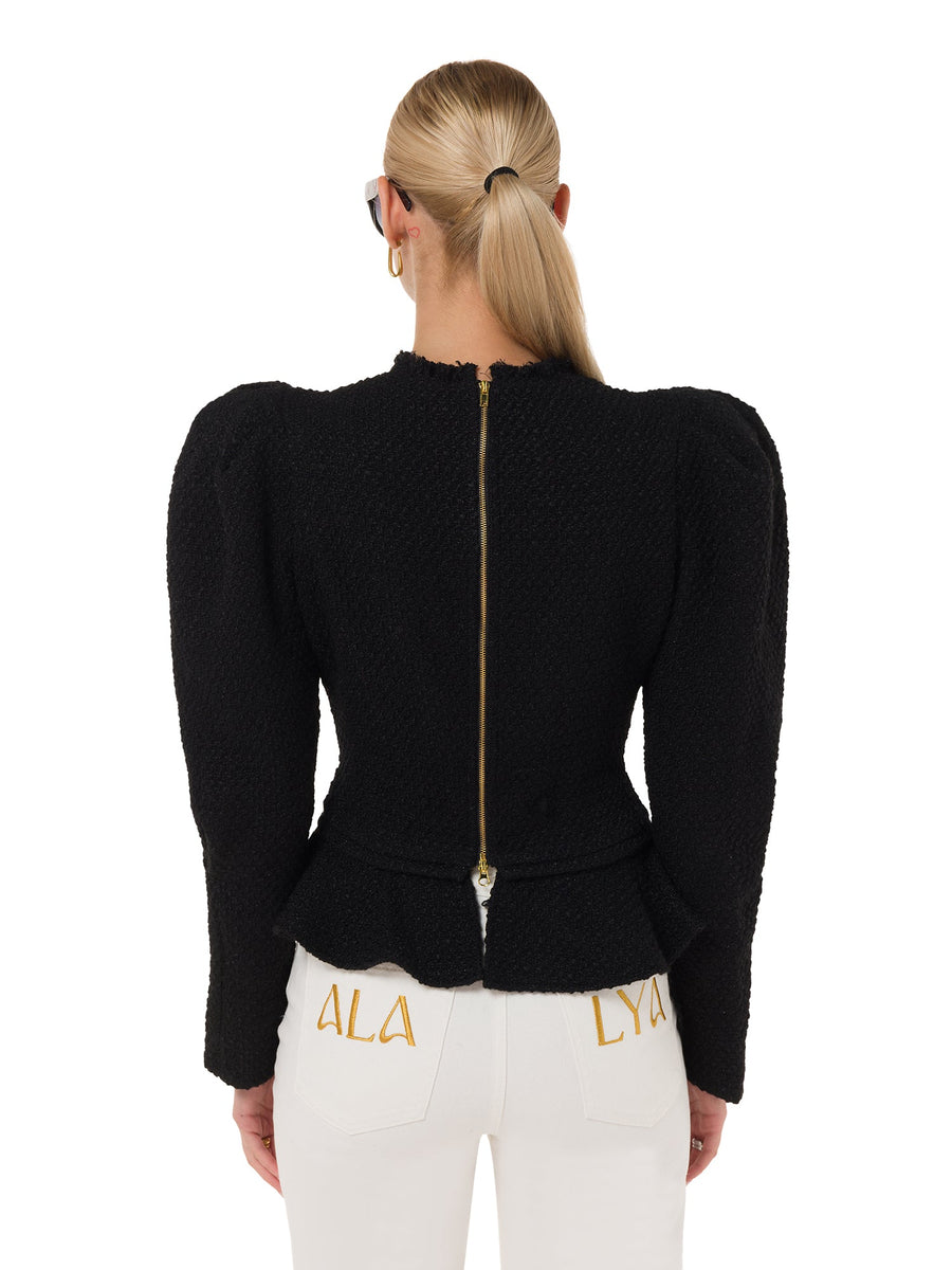 Elegant waist-length black knit top with structured shoulders