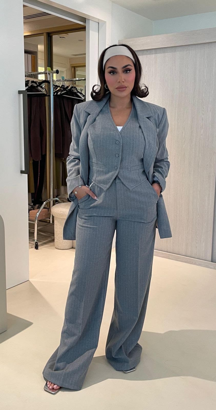 Maison Grise™ 3-piece suit styled with accessories for an editorial fashion presentation

