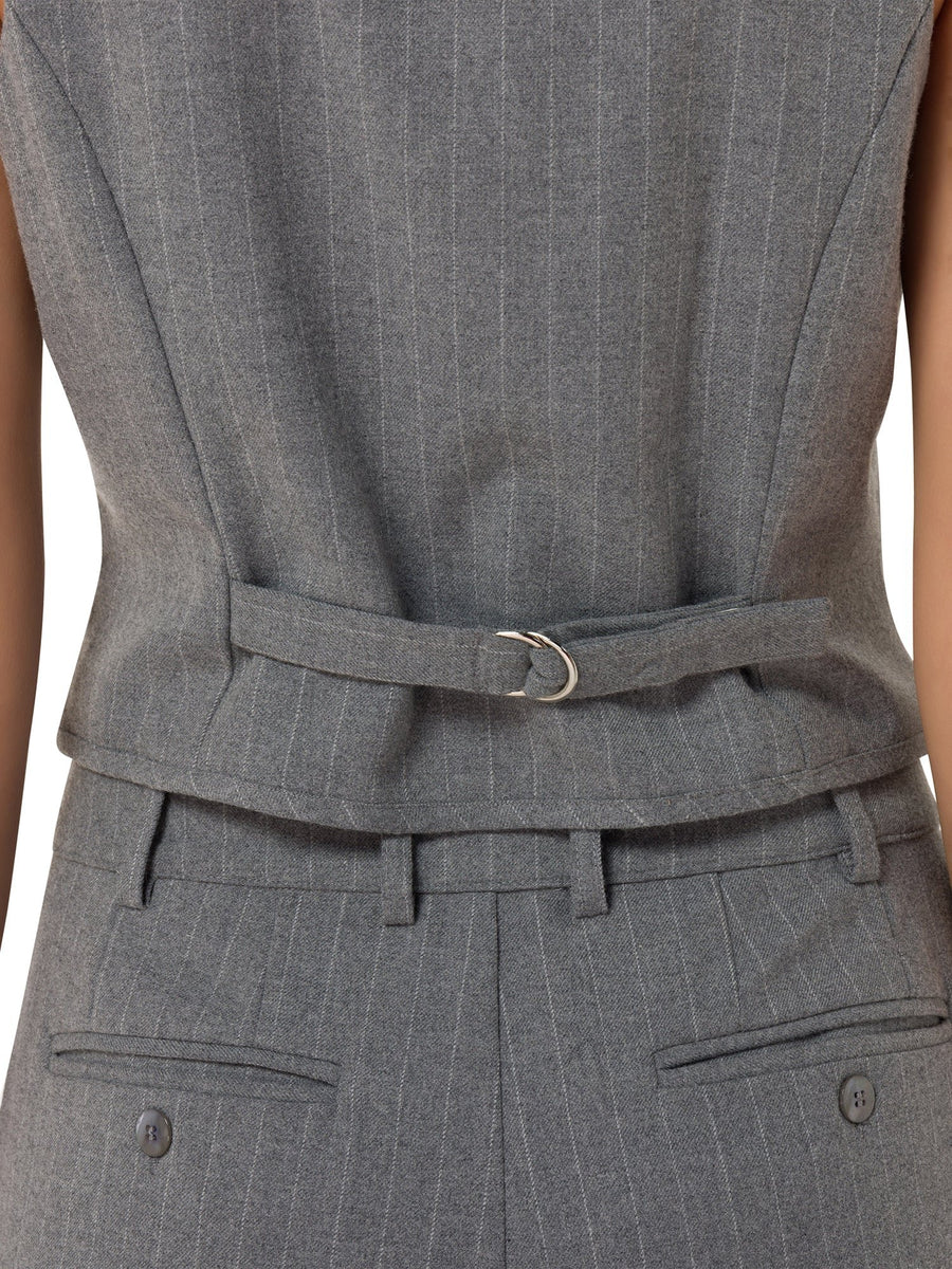 Rear view of Maison Grise™ soft grey vest displaying adjustable strap and smooth finish

