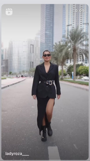 Editorial shot showing movement in slit skirt – ALALYA GCC capsule