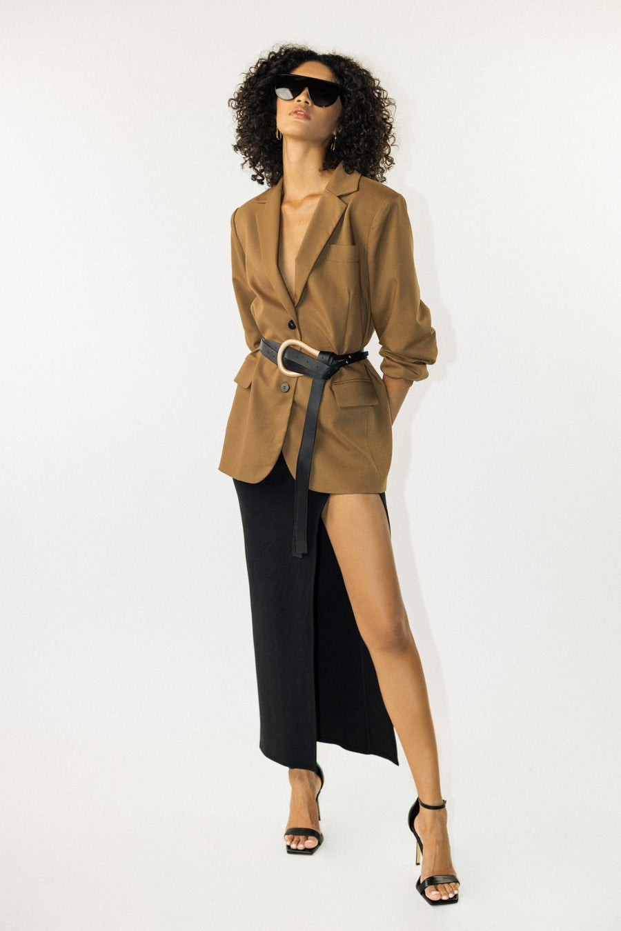 Editorial shot showing movement in slit skirt – ALALYA GCC capsule