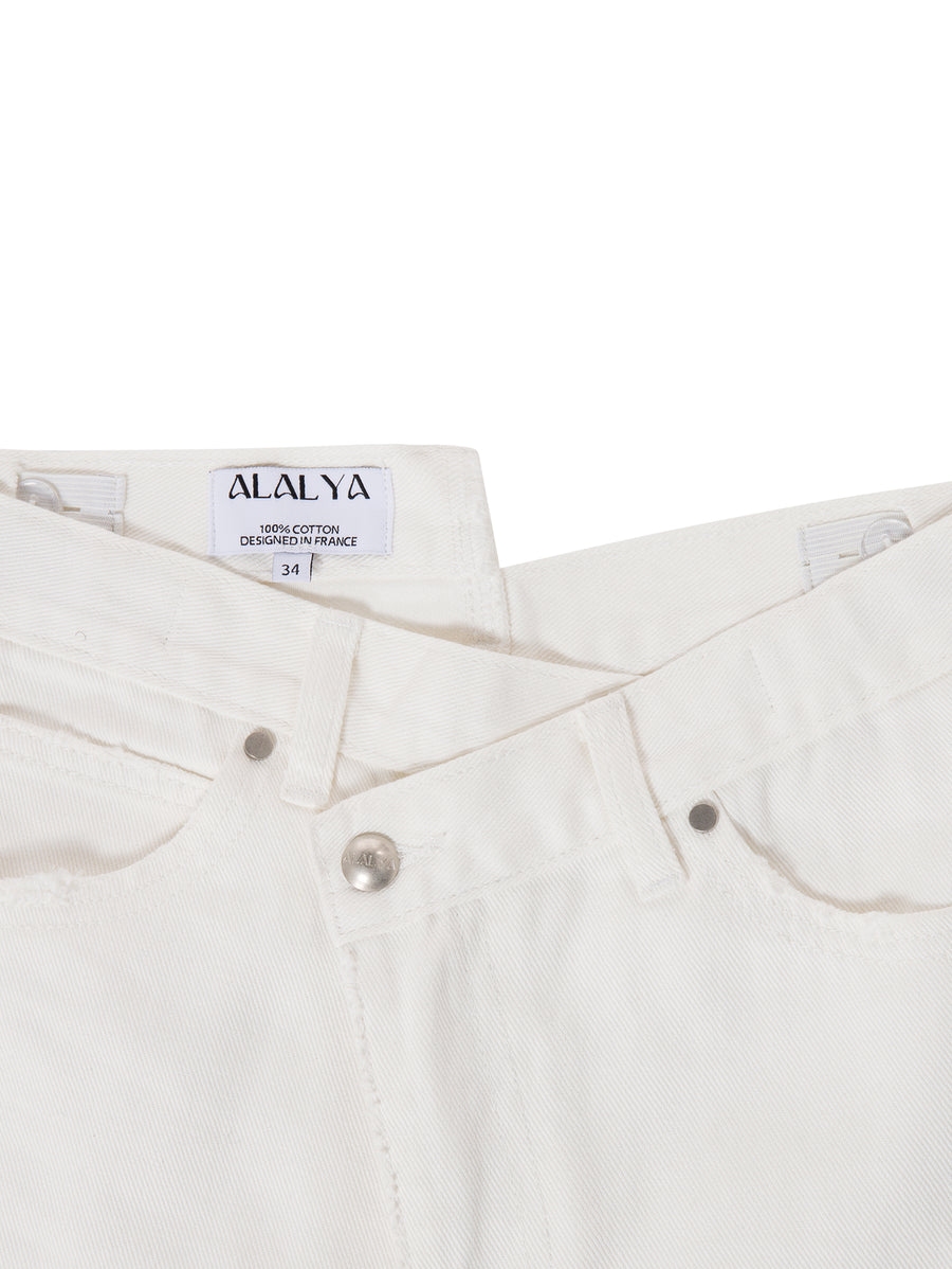 Smart criss-cross waistband detail on luxury white jeans – ALALYA GCC
